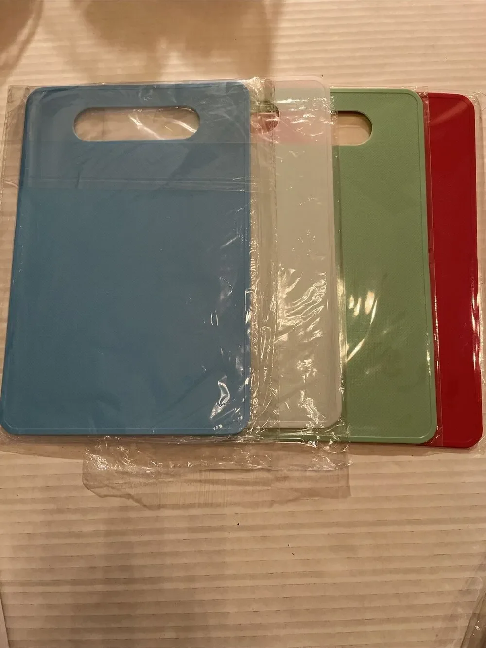 Set Of Four Thin Plastic Cutting Boards 71/2 inches by 11 1/2 inches